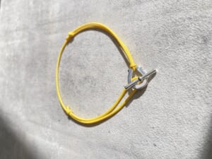 SYMPATHY OF SOUL シンパシーオブソウル　Medium Horseshoe Toggle Cord Bracelet　Silver